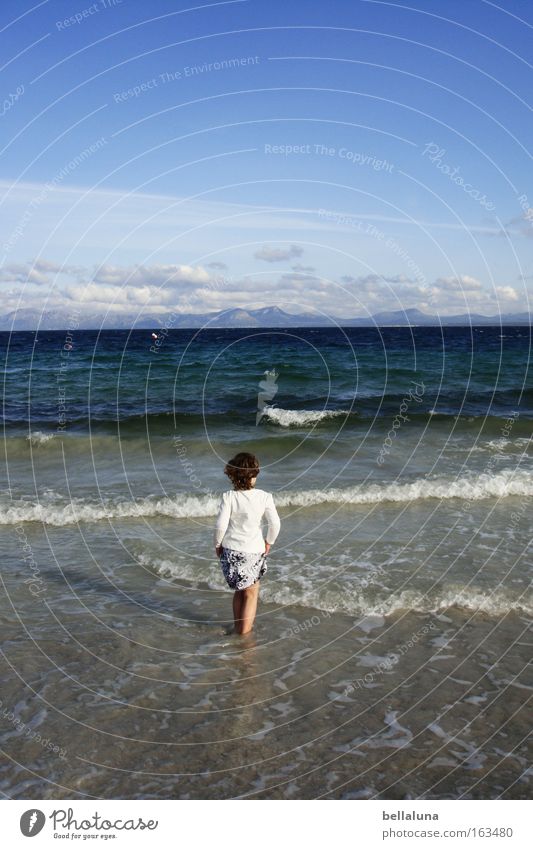 The girl and the sea. Vacation & Travel Ocean Waves Child Girl Sky Clouds Blue White Mediterranean sea Swell To go for a walk Colour photo Multicoloured