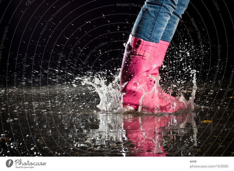 puddle games Colour photo Exterior shot Experimental Abstract Evening Night Flash photo Reflection Motion blur Worm's-eye view Children's game Bad weather Storm