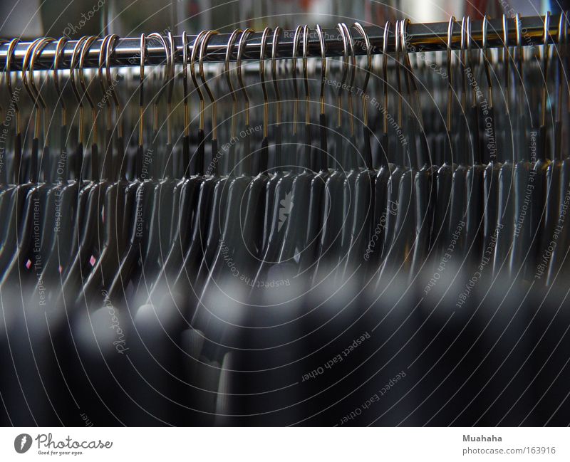 coat hanger Colour photo Close-up Detail Structures and shapes Deserted Copy Space bottom Day Reflection Blur Arrangement Trade Store premises Suit Jacket Coat