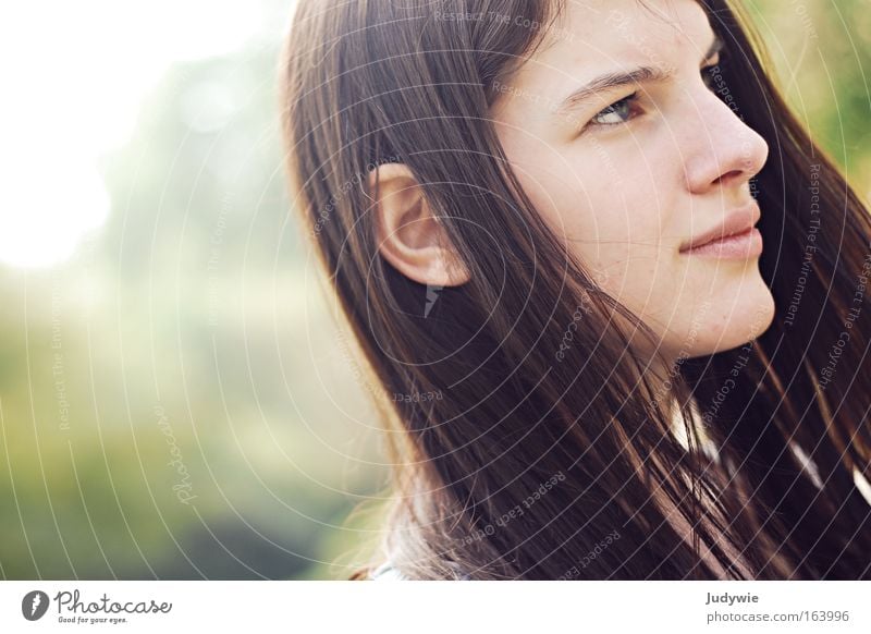 Concentration. Colour photo Exterior shot Copy Space left Day Light Sunlight Portrait photograph Profile Forward Human being Feminine Young woman