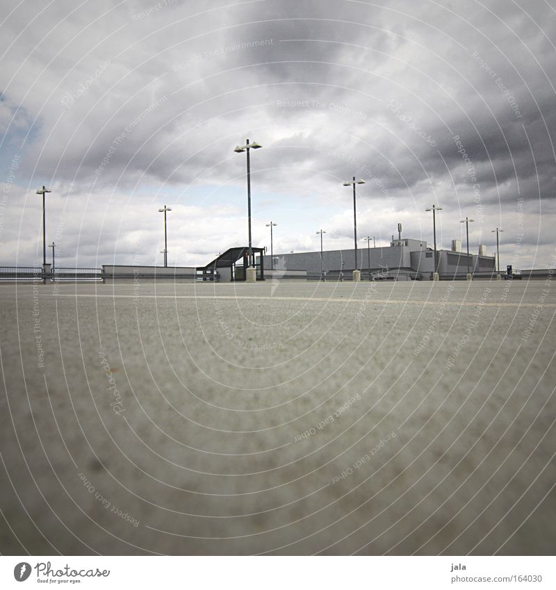 On the Roof Subdued colour Exterior shot Copy Space bottom Twilight Shallow depth of field Worm's-eye view Clouds Wind Town Places Parking garage Building