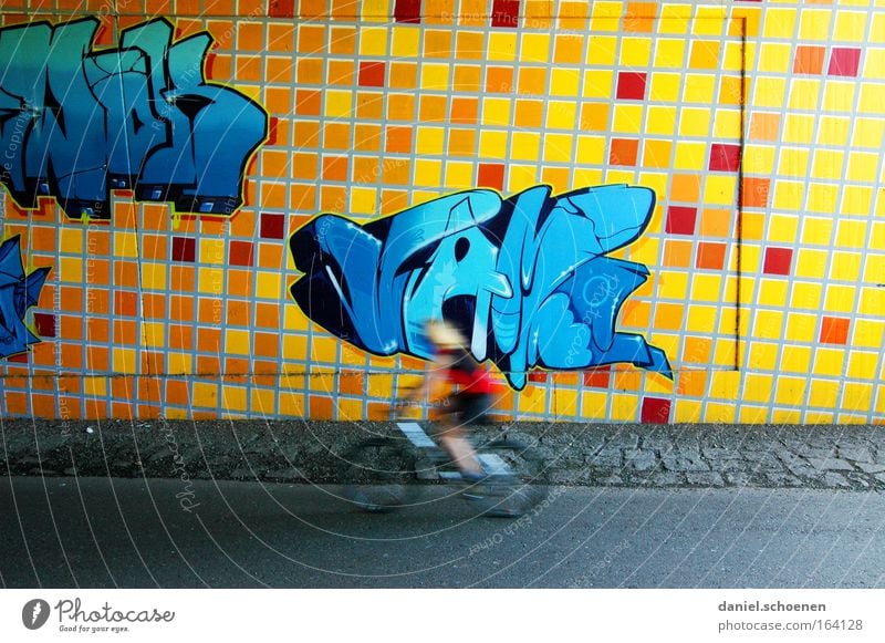 graffiti Colour photo Multicoloured Exterior shot Copy Space top Copy Space bottom Day Shadow Motion blur Long shot Bicycle Human being 1