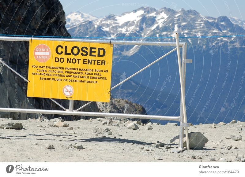 The Mountain is close Colour photo Deserted Copy Space right Day Sunlight Front view Stone Sign Signs and labeling Signage Warning sign Threat Yellow Gray Brave