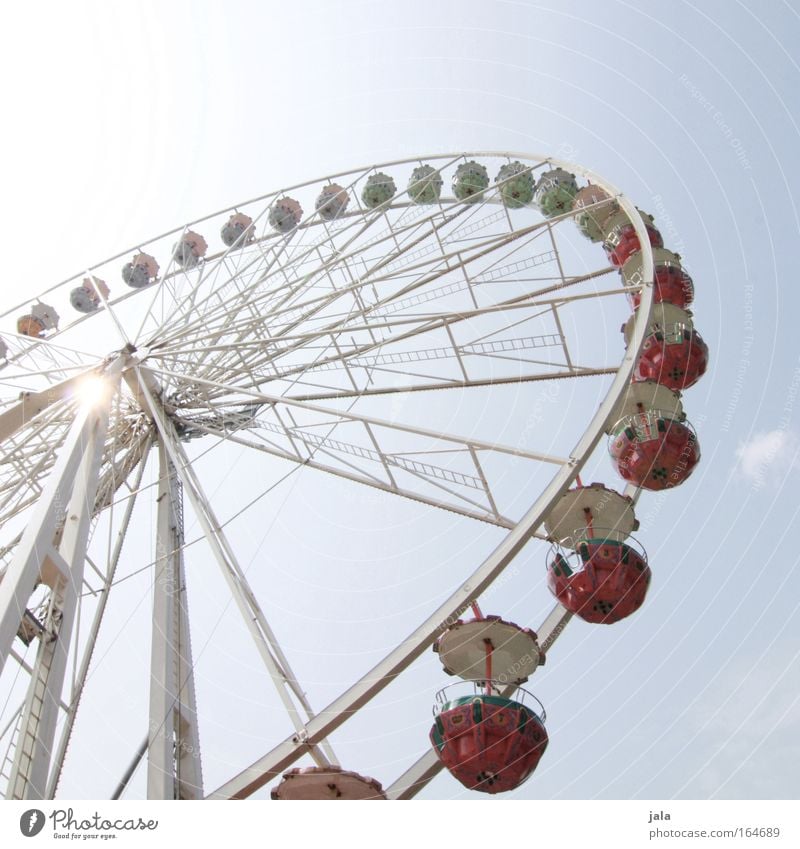 On the fairground Colour photo Subdued colour Exterior shot Deserted Day Light Sunlight Sunbeam Worm's-eye view Lifestyle Joy Happy Playing Fairs & Carnivals