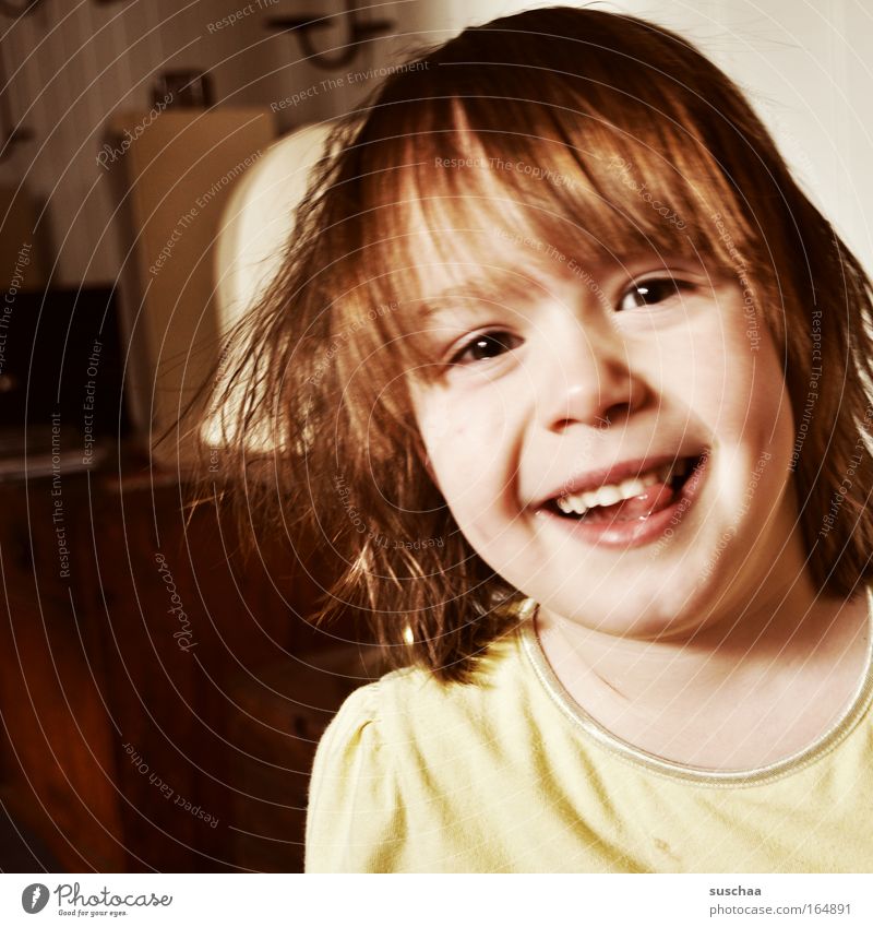 tongue sharpener Subdued colour Interior shot Contrast Portrait photograph Looking into the camera Child Girl Head Hair and hairstyles Face Eyes Ear Nose Mouth