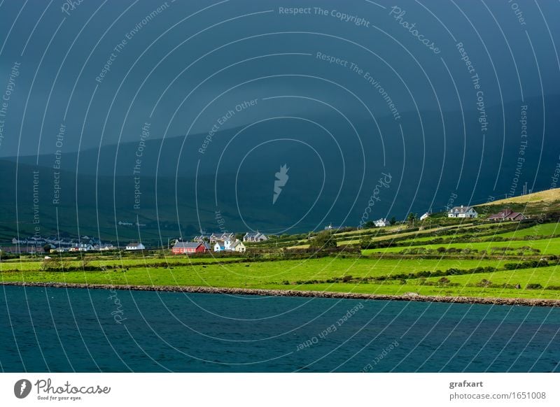 Picturesque coastal settlement in Ireland Coast Rural Landscape Settlement Weather Clouds Atlantic Ocean Dingle Village Loneliness Peaceful