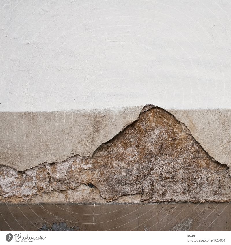 Kilimanjaro Mountain Peak Volcano Wall (barrier) Wall (building) Facade Stone Old Dirty Broken Brown Gray White Decline Transience Time Destruction Plaster