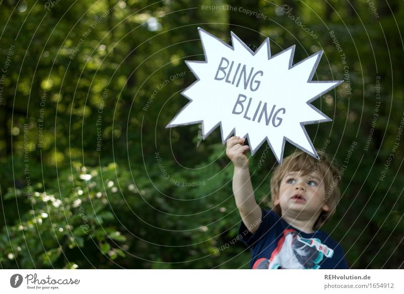 500 |Child holds up speech bubble Human being Masculine Toddler Boy (child) 1 1 - 3 years Environment Nature Plant Summer Tree Forest Sign Characters Signage