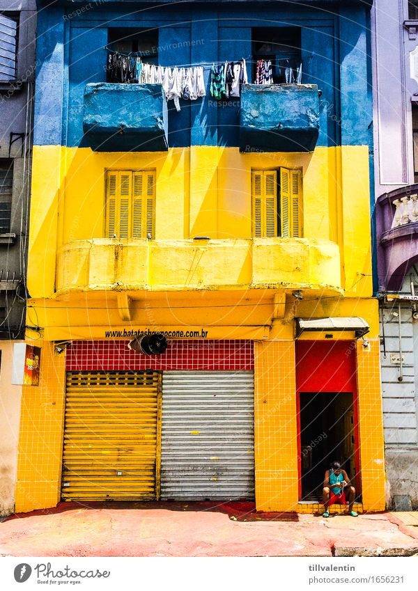 Home Sweet Home 1 Human being Sit Cellphone Blue Yellow House (Residential Structure) Laundry Clothesline Window Store premises Closed Balcony Brazil São Paulo