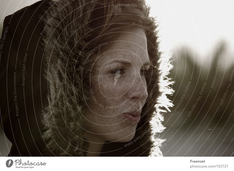 The evening breeze is gentle Colour photo Subdued colour Exterior shot Evening Twilight Shallow depth of field Long shot Portrait photograph Half-profile Happy