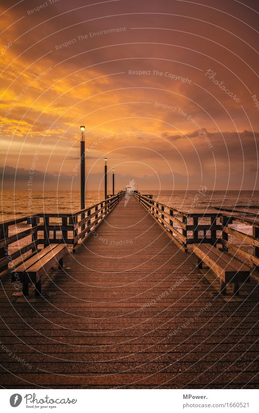 by the sea Environment Nature Water Weather Beautiful weather Bad weather Wind Baltic Sea Footbridge Dusk Glow Waves Lake Ocean Coast Wood Red Orange Loneliness