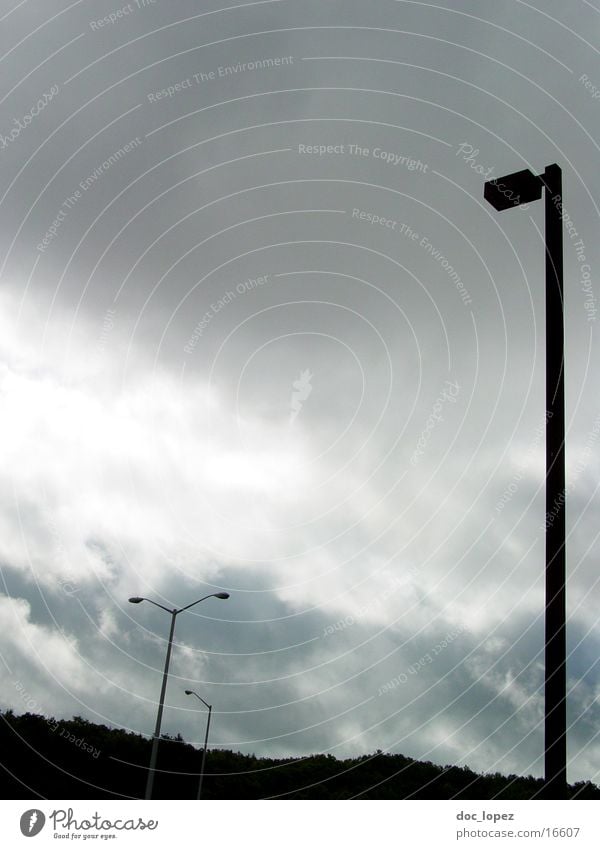 dark_parking_lot Dark Bad weather Clouds Vantage point Lamp Moody Go under Perspective landscape. car park Mountain countryside Electricity pylon USA