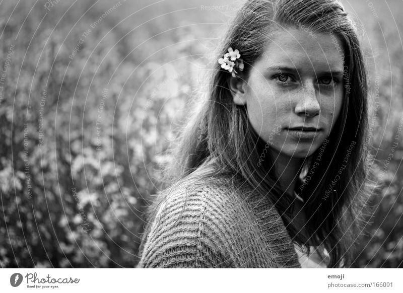 flower child Black & white photo Exterior shot Copy Space left Evening Shallow depth of field Long shot Portrait photograph Upper body Looking