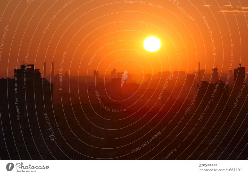 Sunrise over the city. High angle. Aerial view. The roofs of the houses lit by soft warm light. Moscow, Russia. Beautiful House (Residential Structure)