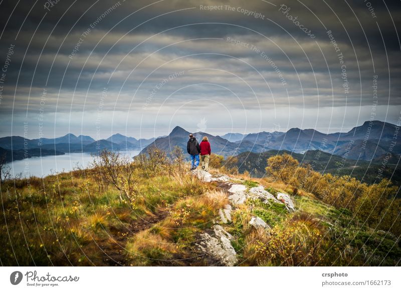 Side by side... Human being Masculine Feminine Couple Partner 2 Nature Landscape Storm clouds Peak Fjord Together Love Infatuation Romance Love affair