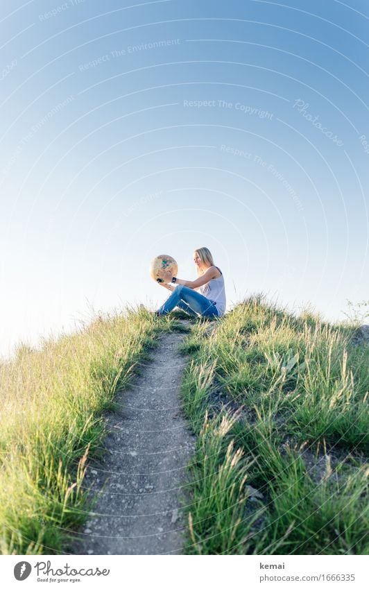 Young blonde woman on hill with globe in hands Lifestyle Style Leisure and hobbies Vacation & Travel Adventure Far-off places Freedom Expedition Summer