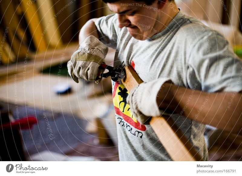 nail pulling Colour photo Interior shot Copy Space left Artificial light Shallow depth of field Upper body Front view Downward Professional training Apprentice