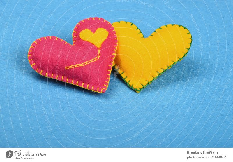 two handmade FELT hearts, pink and yellow together on blue Leisure and hobbies Handcrafts Valentine's Day Wedding Art Work of art Toys Heart Love Together Small