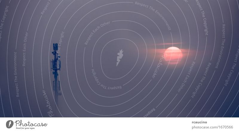 Mobile phone antenna tower emerges from the fog Sun Industry Telecommunications Business Telephone Cellphone Technology Internet Sky Building Antenna