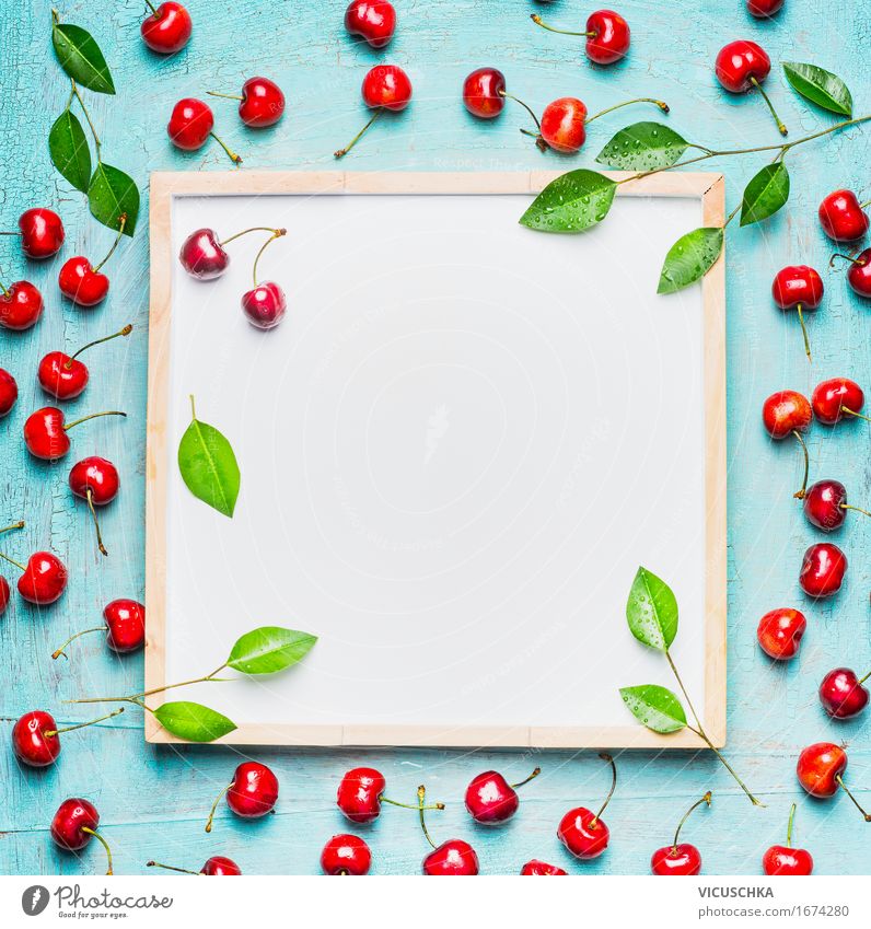 Beautiful ripe sweet cherries with leaves around white board Food Fruit Dessert Nutrition Breakfast Picnic Organic produce Vegetarian diet Diet Juice Style