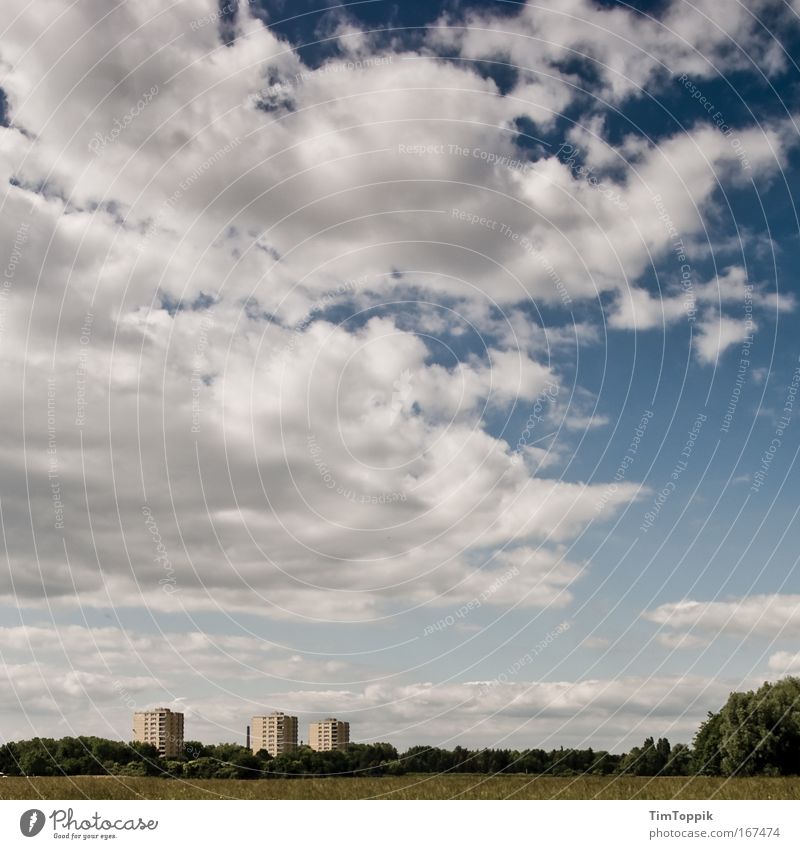 the three towers Exterior shot Wide angle Environment Nature Landscape Sky Clouds Meadow Field Forest Town Outskirts House (Residential Structure) High-rise