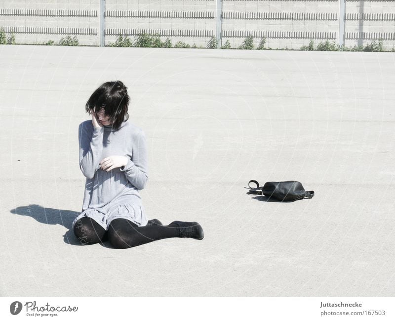 What do we do now? Woman Young woman Sit Crouch Sheepish Shadow Contrast Gray Bright Bag Handbag Mini dress Dress Places Concrete Meditative Think Timidity