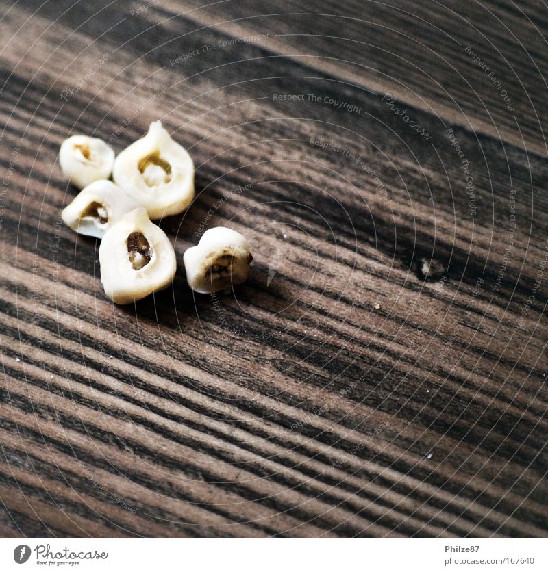 When the tooth fairy goes on strike Interior shot Close-up Structures and shapes Teeth Milk teeth Wood Disgust Small Brown Tooth root Malfunction Wood grain