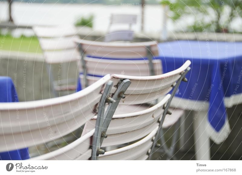 Empty chairs and tables in the outdoor catering Colour photo Exterior shot Close-up Deserted Day Shallow depth of field To have a coffee Trip Summer vacation