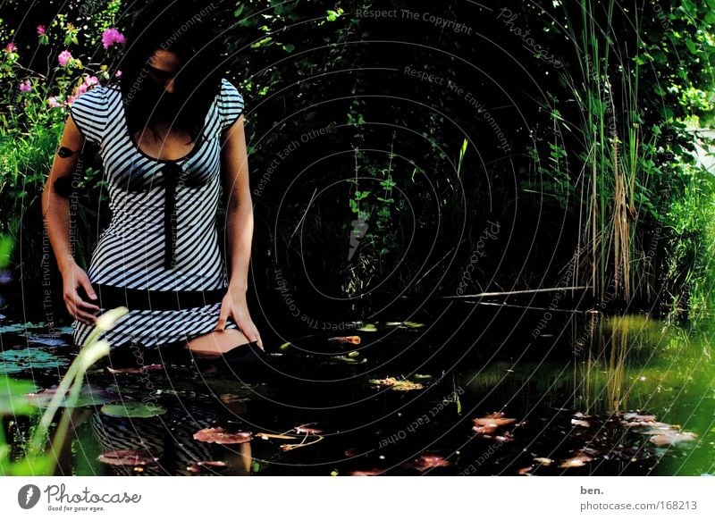 gardening Colour photo Exterior shot Copy Space right Day Shadow Reflection Full-length Downward Exotic Beautiful Human being Feminine Young woman