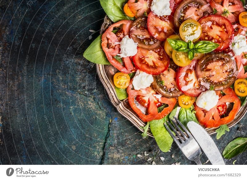 Classic salad with tomatoes and mozzarella Food Cheese Vegetable Lettuce Salad Herbs and spices Cooking oil Nutrition Lunch Dinner Organic produce