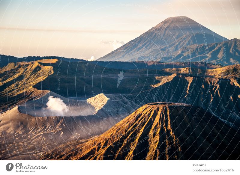 Bromo sunrise Vacation & Travel Adventure Far-off places Expedition Landscape Clouds Mountain Volcano bromo Volcanic crater Exhaust gas Shroud of fog Outbreak