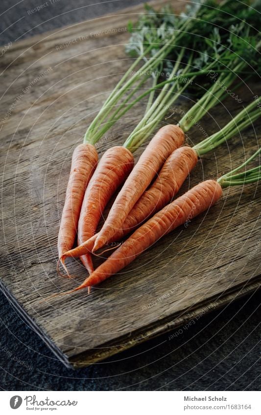 Bunch of carrots Food Vegetable Lettuce Salad Nutrition Eating Juice Healthy Eating Wood Diet To feed Esthetic Good Original Green Orange Fresh Produce