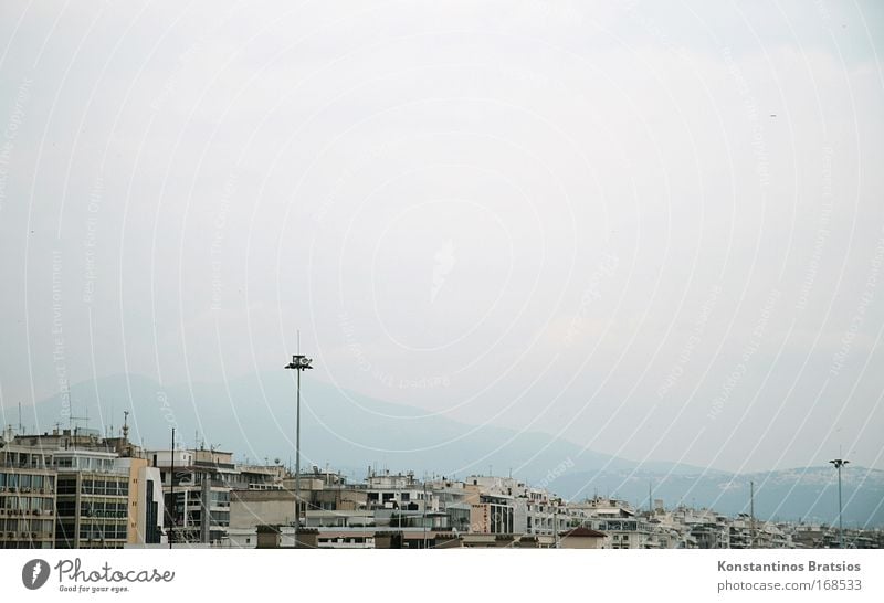 submerged in haze Colour photo Subdued colour Exterior shot Deserted Copy Space right Copy Space top Copy Space middle Evening Sky Clouds Bad weather Mountain