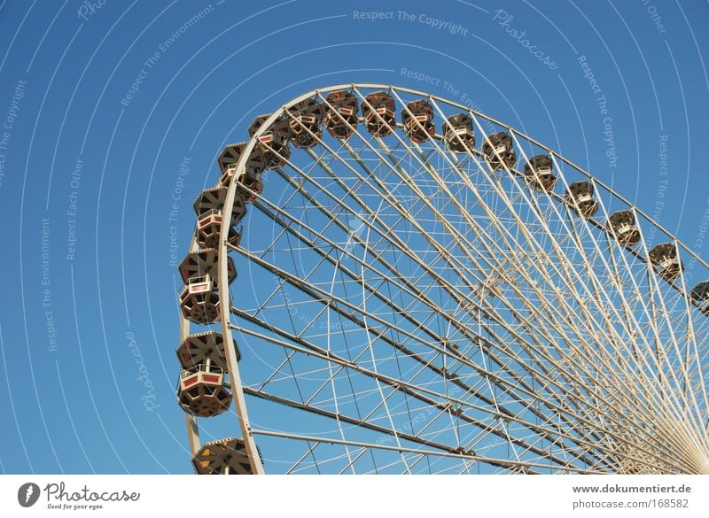 Ferris wheel Colour photo Exterior shot Copy Space left Copy Space bottom Day Joy Relaxation Leisure and hobbies Playing Fairs & Carnivals Trip Closing time