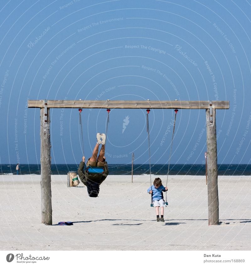 Swings: pro and contra Colour photo Multicoloured Exterior shot Copy Space top Copy Space bottom Day Shadow Deep depth of field Long shot Downward Human being