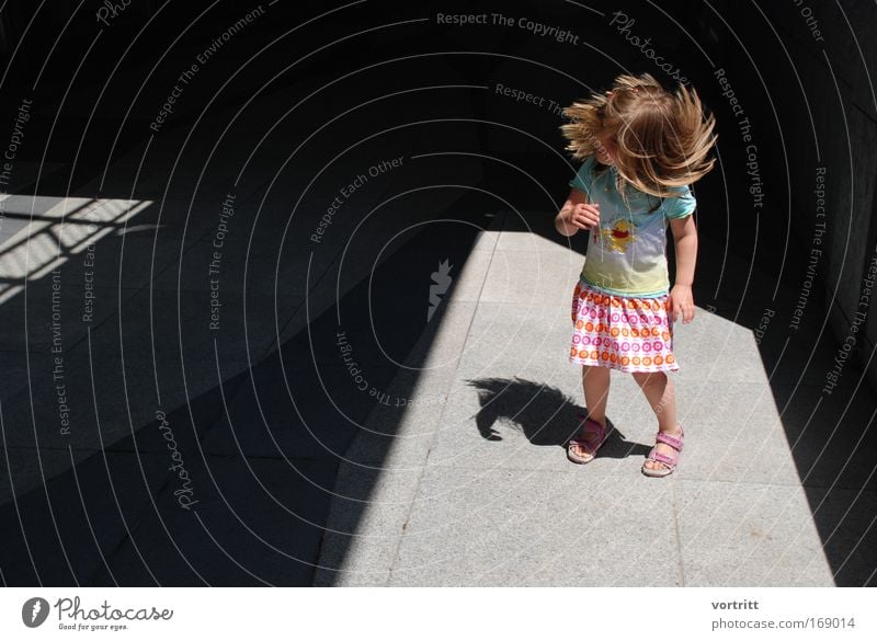 the world keeps turning Exterior shot Copy Space left Neutral Background Day Light Shadow Contrast Sunlight Downward Joy Human being Child Girl 1 3 - 8 years