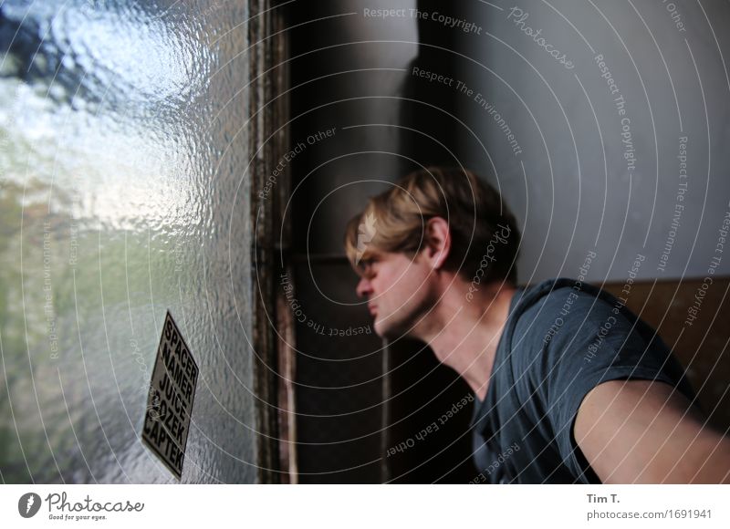 inquisitiveness Human being Masculine 1 30 - 45 years Adults Berlin Prenzlauer Berg Stairs Window Curiosity Colour photo Interior shot