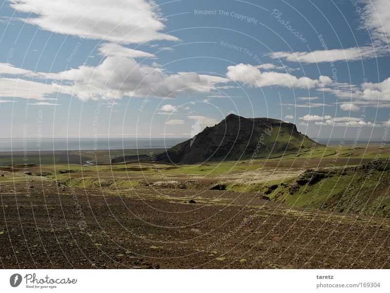 Always by the sea. Vacation & Travel Far-off places Freedom Summer Ocean Mountain Landscape Elements Clouds Beautiful weather Hill Rock Coast Nature Iceland