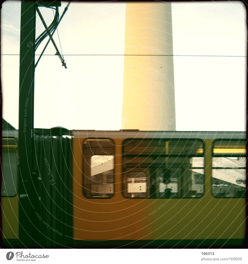 Photo number 124453 Tram Empty Driving Past Section of image Deserted Metal Transport Town Haste Expressionless Loneliness Architecture Yellow Carriage