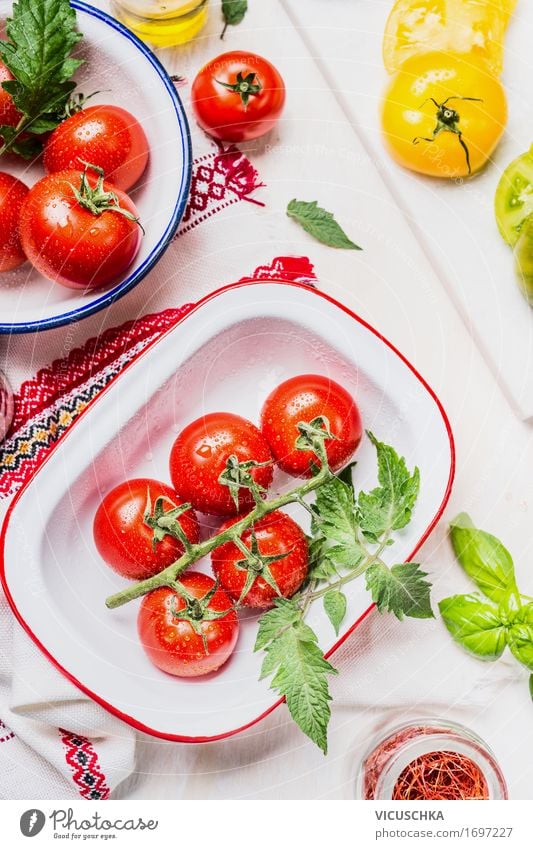 Colorful tomatoes in enamel bowls Food Vegetable Lettuce Salad Nutrition Lunch Buffet Brunch Organic produce Vegetarian diet Diet Crockery Bowl Style Design