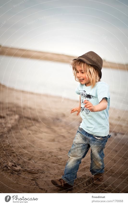 mucky pup Colour photo Subdued colour Exterior shot Copy Space left Day Shallow depth of field Wide angle Full-length Forward Closed eyes Human being Masculine