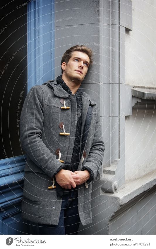 young man waiting in the house entrance Lifestyle Style Human being Masculine Young man Youth (Young adults) Man Adults 1 18 - 30 years Door Jacket Coat Blonde