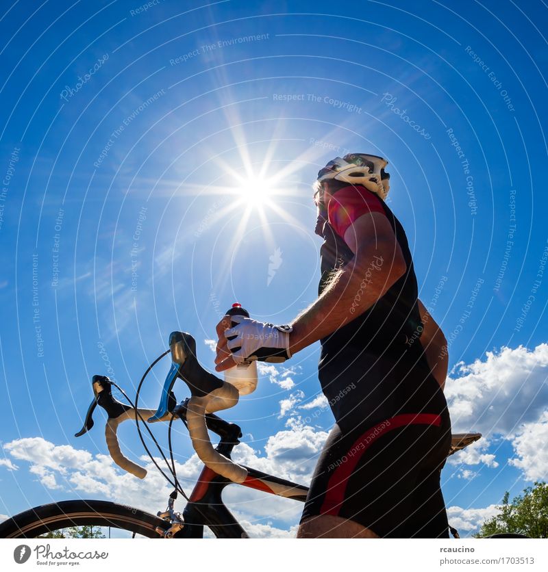 Cyclist resting and drinking isotonic drink Drinking Bottle Lifestyle Joy Relaxation Leisure and hobbies Vacation & Travel Adventure Freedom Summer Sun Sports