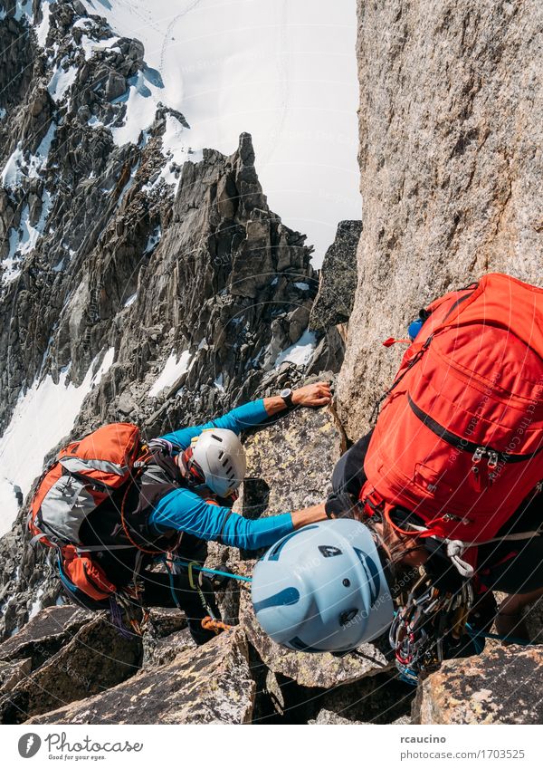 climbers reach the top of a mountain peak. Mont Blanc, Chamonix Lifestyle Beautiful Vacation & Travel Adventure Expedition Winter Snow Mountain Hiking Sports