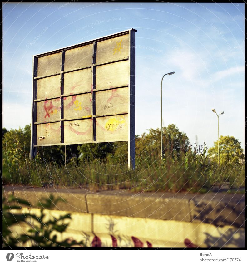 concrete Street lighting Deserted Train station Manmade structures Commuter trains Platform Concrete Wood Signs and labeling Old Trashy Loneliness Trade Modern