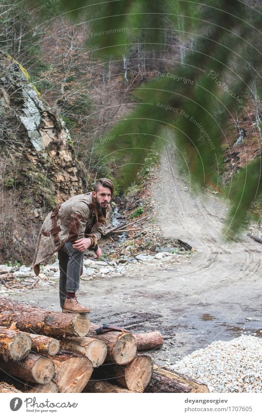 Young men on logs in the forest. Leather and jeans Lifestyle Happy Summer Human being Boy (child) Man Adults Nature Tree Forest Fashion Jeans Footwear Think