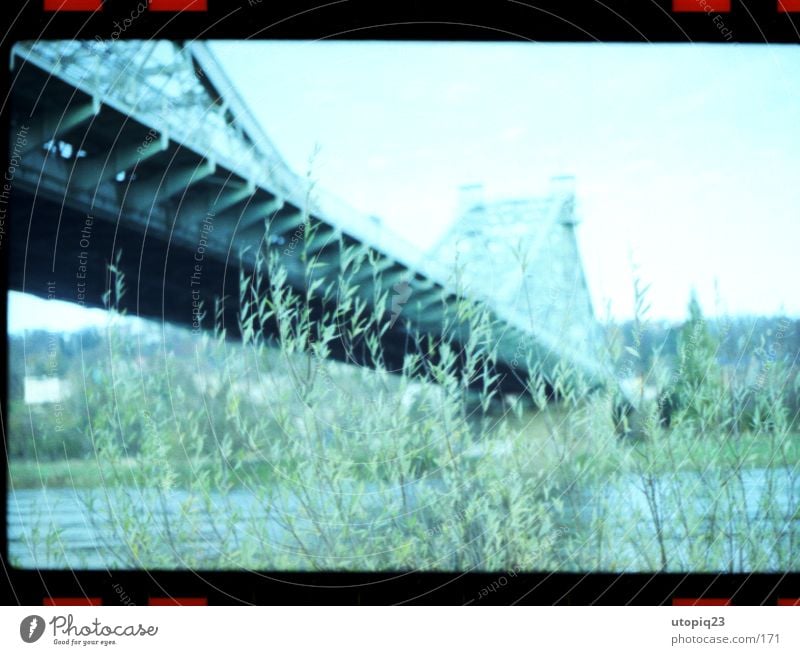 Blue miracle Water Bridge Architecture Cold Green Wonder River bank Traverse Dresden Tourist Attraction Subdued colour Exterior shot Experimental Polaroid