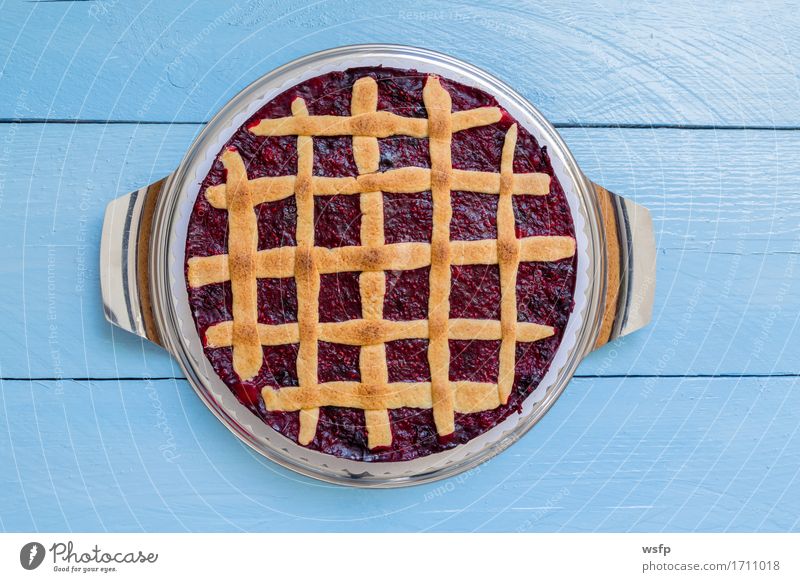 Grid cake with forest berries on blue wood rustic Cake Dessert Wood Blue lattice cake wild berries Wooden board Baked goods Baking Berries sponge cake Sweet