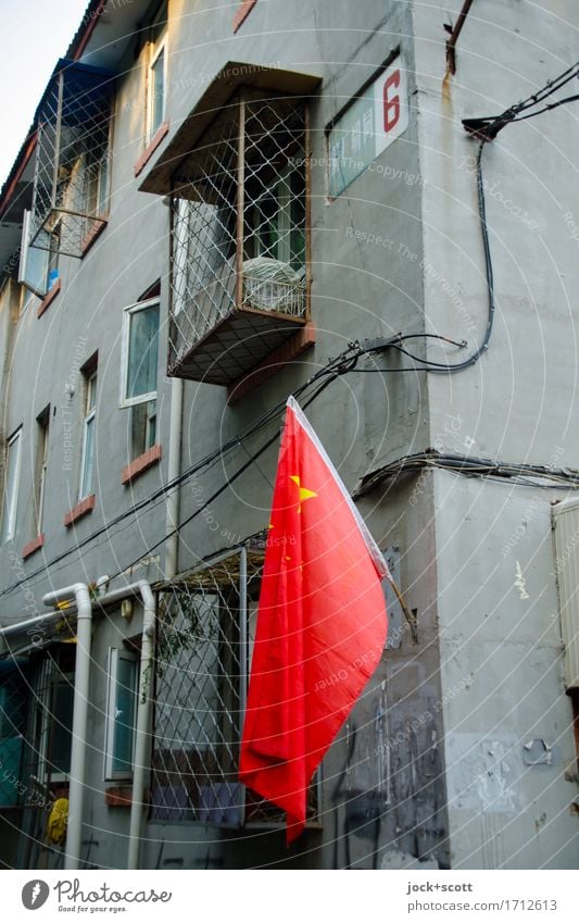 fly the flag City trip Beijing Downtown Town house (City: Block of flats) Wall (building) Facade Flag Corner Authentic Sharp-edged Gray Politics and state Pride