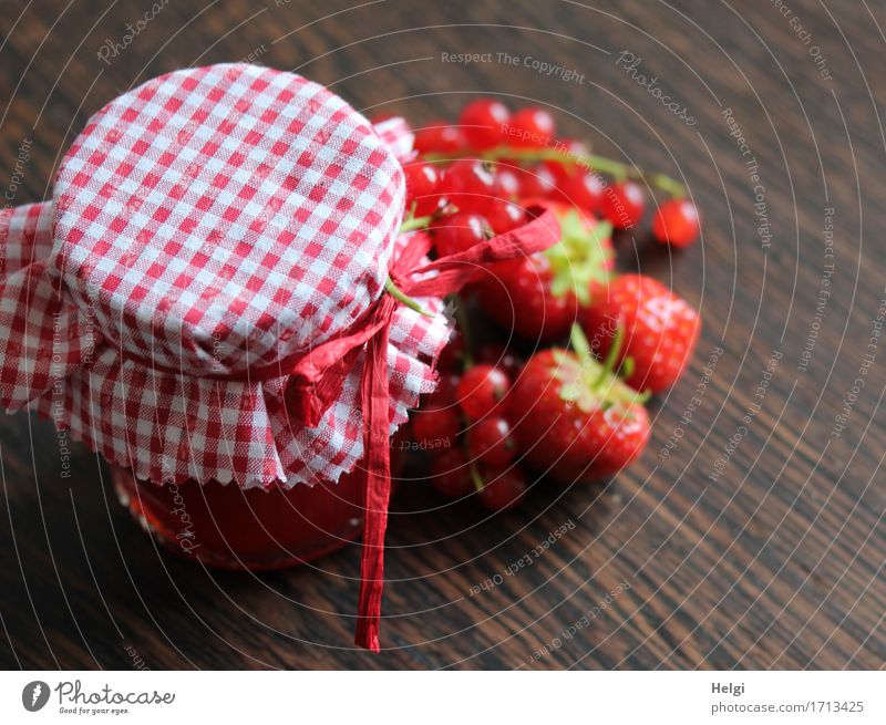 homemade food Food Fruit Jam Strawberry Redcurrant Nutrition Organic produce Vegetarian diet Glass Decoration Bow Cloth Wood Stand Esthetic Fresh Beautiful